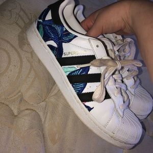 Superstar adidas with blue embroidery
